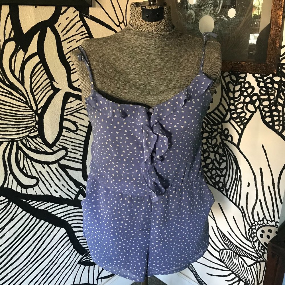 It has pockets!  Heart Jumper/ romper